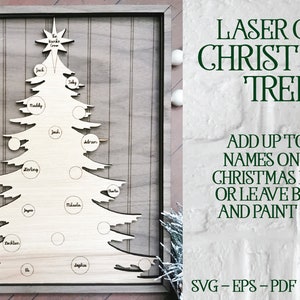 May include: Laser cut wooden Christmas tree with 20 blank circles for names. The tree is on a wood background with a black frame. The text "LASER CUT CHRISTMAS TREE" is in green letters on a white brick background. The text "ADD UP TO 20 NAMES ON THE CHRISTMAS BALLS OR LEAVE BLANK AND PAINT TREE." is in black letters on a white brick background. The text "SVG-EPS-PDF-PNG-AI" is in black letters on a white brick background.