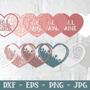 Pu&ograve; includere: Un set di otto sagome a forma di cuore sovrapposte per l'artigianato. I cuori presentano diversi design, tra cui motivi floreali e il testo "All Mine".
