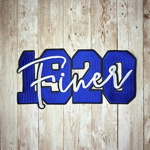 May include: A blue embroidered patch featuring the numbers 1920 in a bold block font with a black border. The word Finer is stitched across the numbers in a white cursive script font, creating a layered design with clear, defined edges.