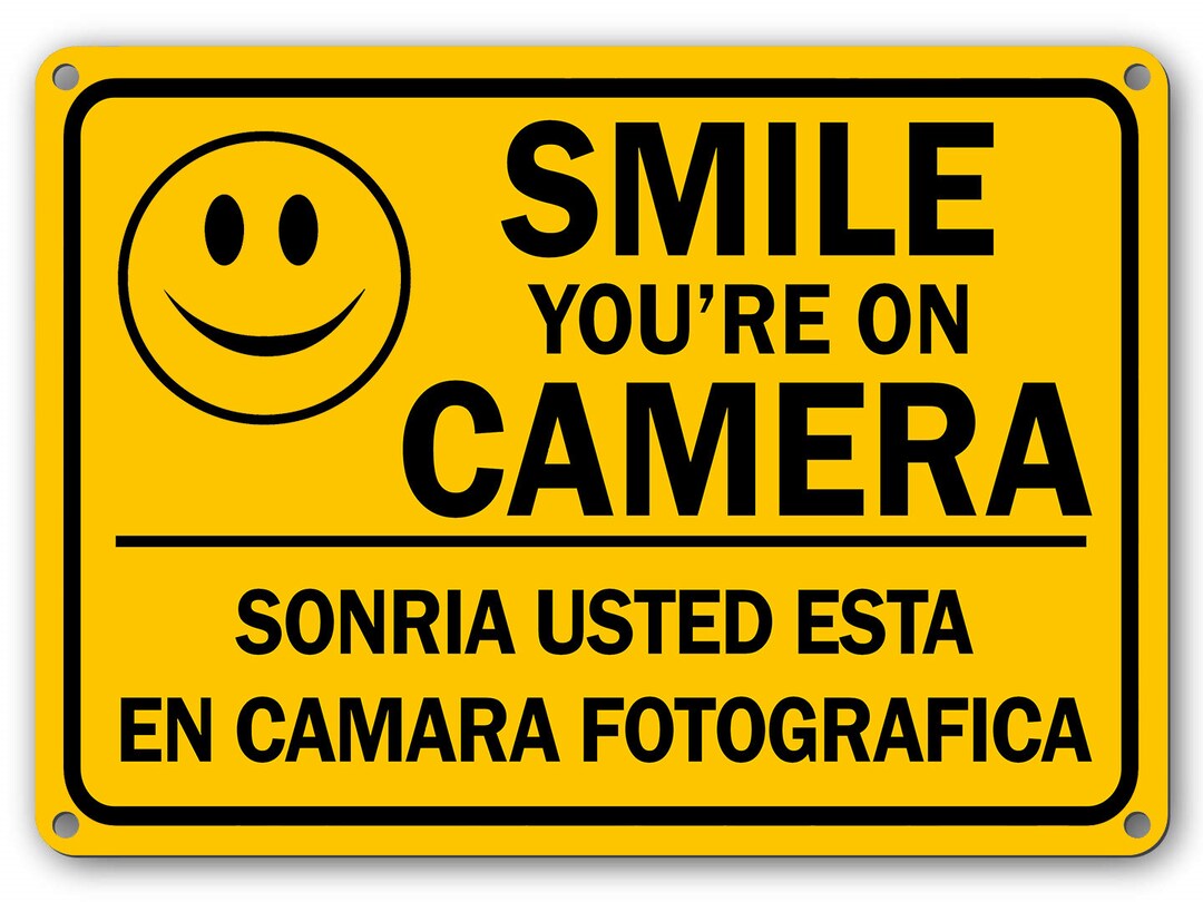 Smile Youre on Camera English Spanish Sign Yellow Plastic 11x 7 Rust