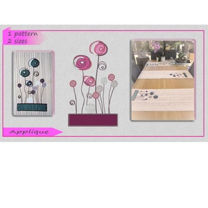 May include: A set of two pink and gray floral table runners with a striped background. The runners feature a stylized floral design with pink, gray, and black accents. The text "Applique" is visible in the image.
