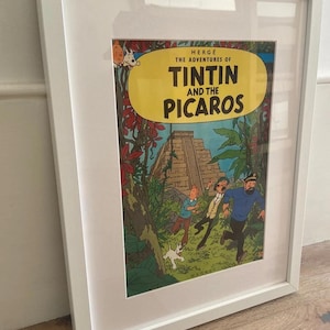 Tintin wall art framed; vintage Tintin in Picaros Magazine cover in white frame. Ideal Tintin fan birthday gift, for nursery or child&#39;s room
