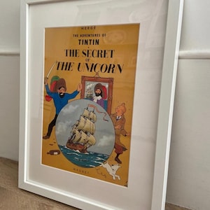 Tintin wall art; The Secret of the Unicorn Magazine cover framed. Ideal Tintin fan birthday gift, for nursery or child&#39;s bedroom