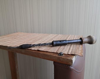 Screwdriver. Old, slotted, reversible screwdriver made in the USSR in the 40s-50s Vintage Soviet screwdriver with a spiral ratchet mechanism
