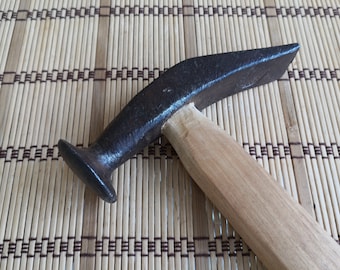 Old shoe hammer 60s. Old shoemaker's tool. Forged Shoemaker Tool. Vintage, Soviet, forged shoe hammer 60s. Shoemaker's tool.