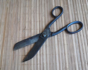 Vintage tool of a tailor shoemaker. Sturdy Soviet old large scissors 1930s. Gift idea. Forged antique barber scissors. A tool for creativity
