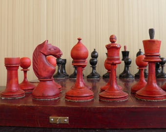 Old chess. Vintage, Soviet weighted chess 1920s and 1930s. Chess with kettlebells, chess set with weighting materials. Antique wooden chess.