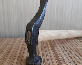 Shoemaker's tool. Old shoe hammer 1960s. Vintage, Soviet, forged shoe hammer 1960s. Old shoemaker's tool. Vintage, Soviet Shoemaker Tool 60s