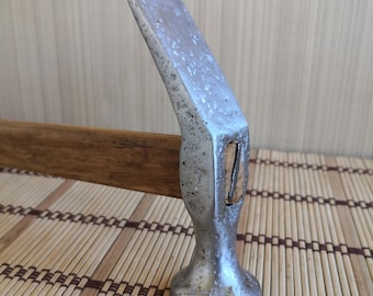 Vintage, Soviet, chrome-plated, forged, shoe hammer. An old shoemaker's tool. Soviet Leather Working USSR Workshop. Shoemaker's tool.