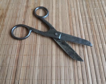 Antique large Soviet scissors. Sewing forged large vintage scissors. Old steel forged shoemaker's scissors. Antique tailor-shoemaker's tool.