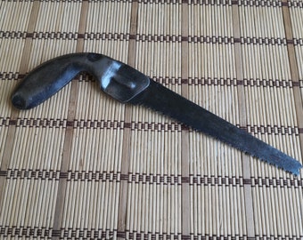 Vintage, Soviet hand tools for cutting wood. An old saw 50s.  Hacksaw for wood. Garden tools. Carpenter, joiner tool. Saw for needlework.