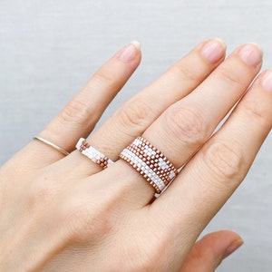 Pair of woven white rings, Stackable bands set his and hers, Handmade unique jewelry set, Glass rings for woman, White bronze beaded rings image 6