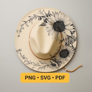 May include: A cream-colored fedora hat with a brown leather band and a decorative black and white sunflower design. The hat has a wide brim and a tan-colored crown. The text "PNG • SVG • PDF" is displayed on a yellow rectangle.