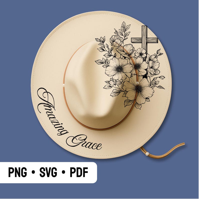 May include: A cream-coloured fedora-style hat with a brown band and a chin strap. The hat features a floral and cross design in black ink, along with the words "Amazing Grace" in a script font. The bottom left corner has the text "PNG &bull; SVG &bull; PDF".