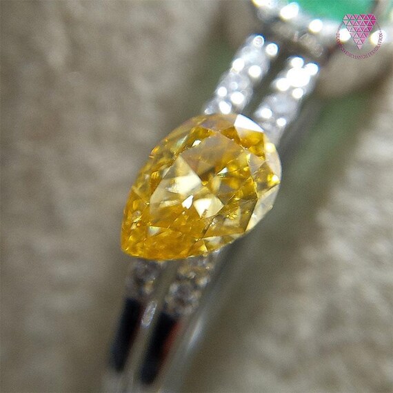0.337 Ct Fancy Intense Orange Yellow SI2 CGL Japan Natural Loose 