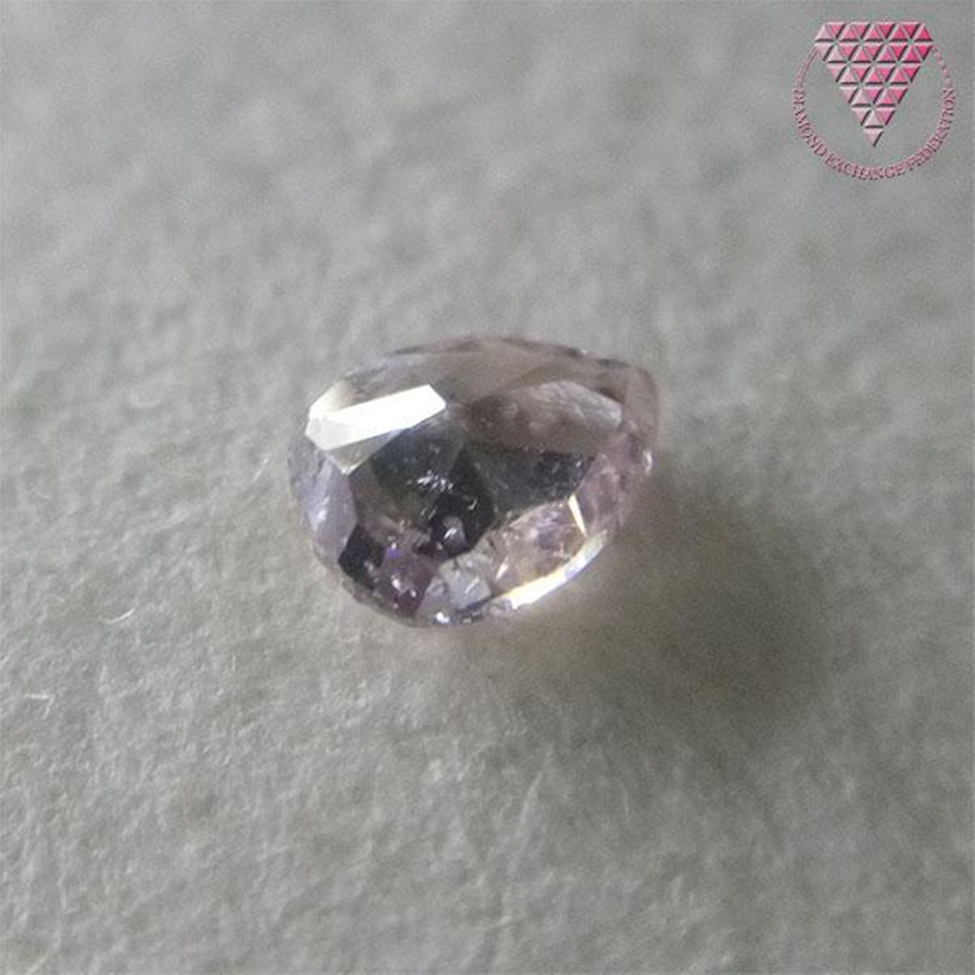 0.200 Ct Fancy Light Orangy Pink SI2 CGL Japan Natural Loose