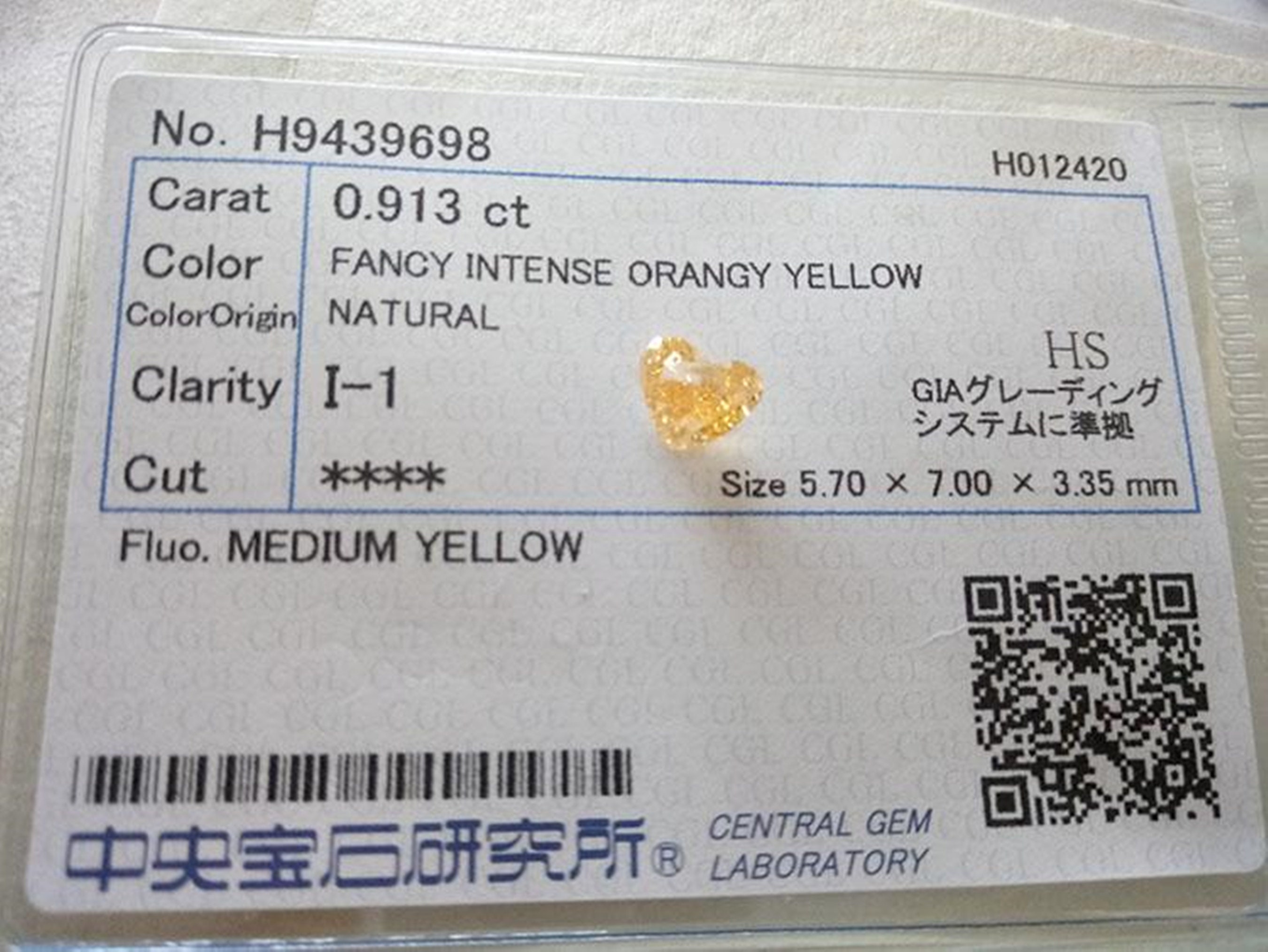 0.913 Ct Fancy Intense Orangy Yellow I1 CGL Japan Natural