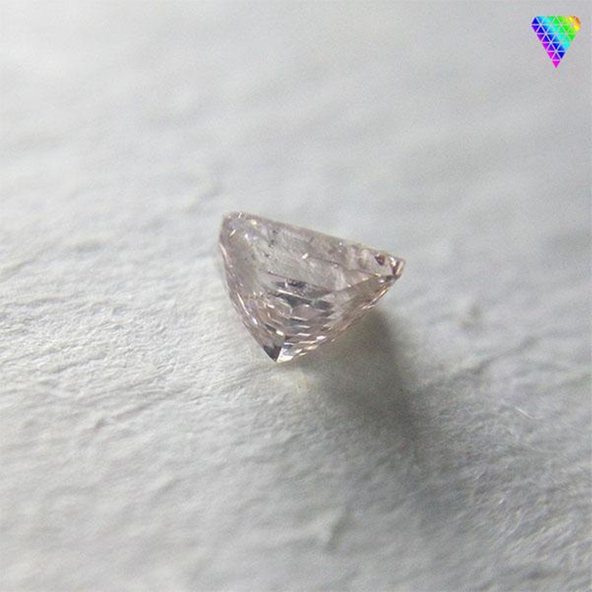 0.102 Ct Light Brownish Pink I1 CGL Japan Natural Diamond