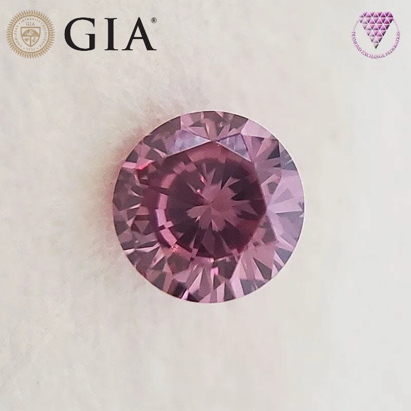 0.07 Carat Fancy Vivid Purplish Pink Gia Natural Diamond, Round Shape,  Clarity SI1 , GIA