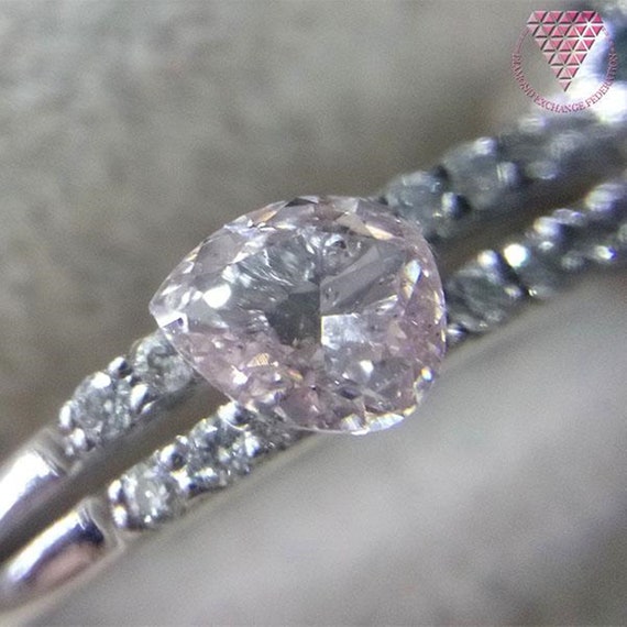 0.200 Ct Fancy Light Orangy Pink SI2 CGL Japan Natural Loose