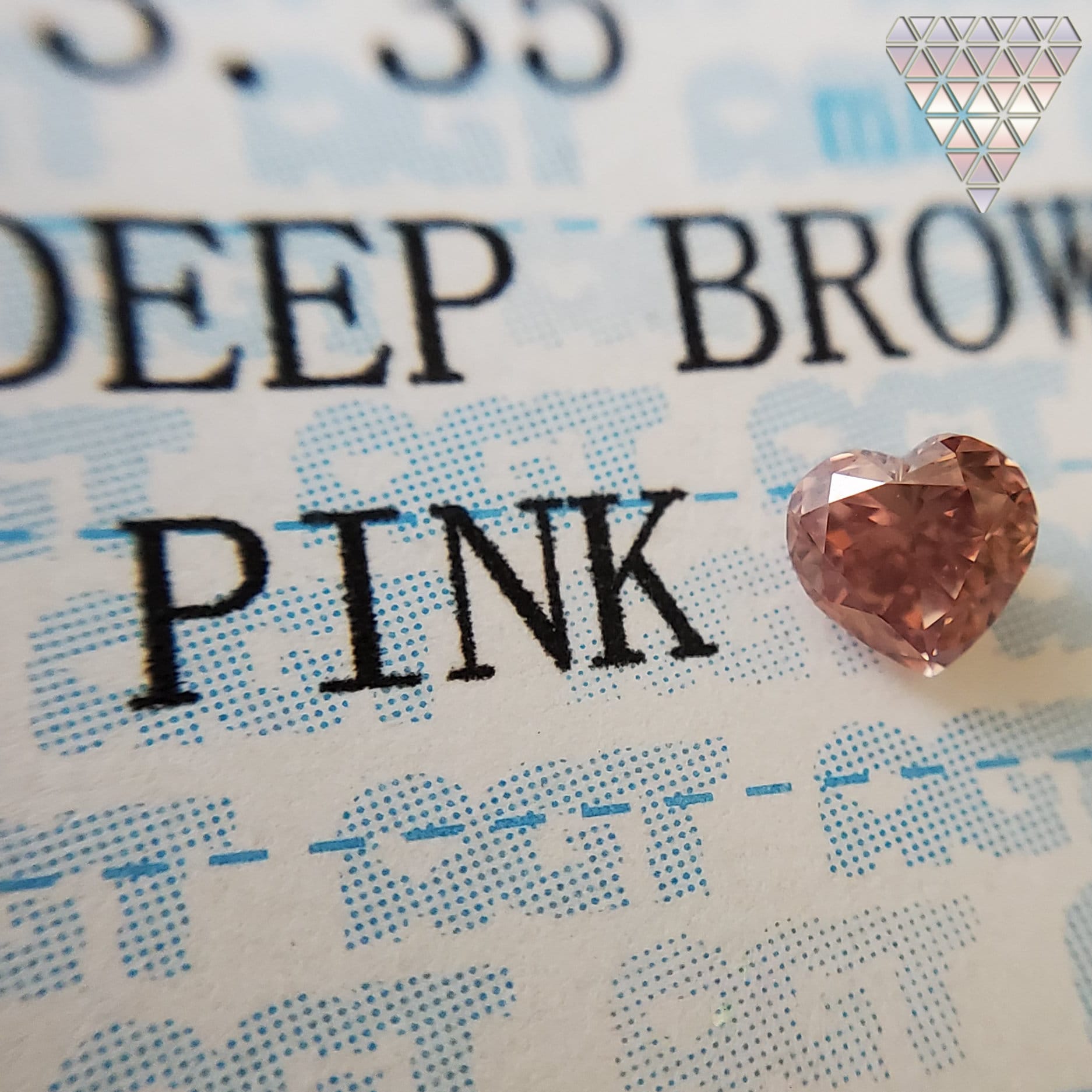 0.17 Ct Fancy Deep Orangy Brownish Pink Vs1 Heart Agt Japan