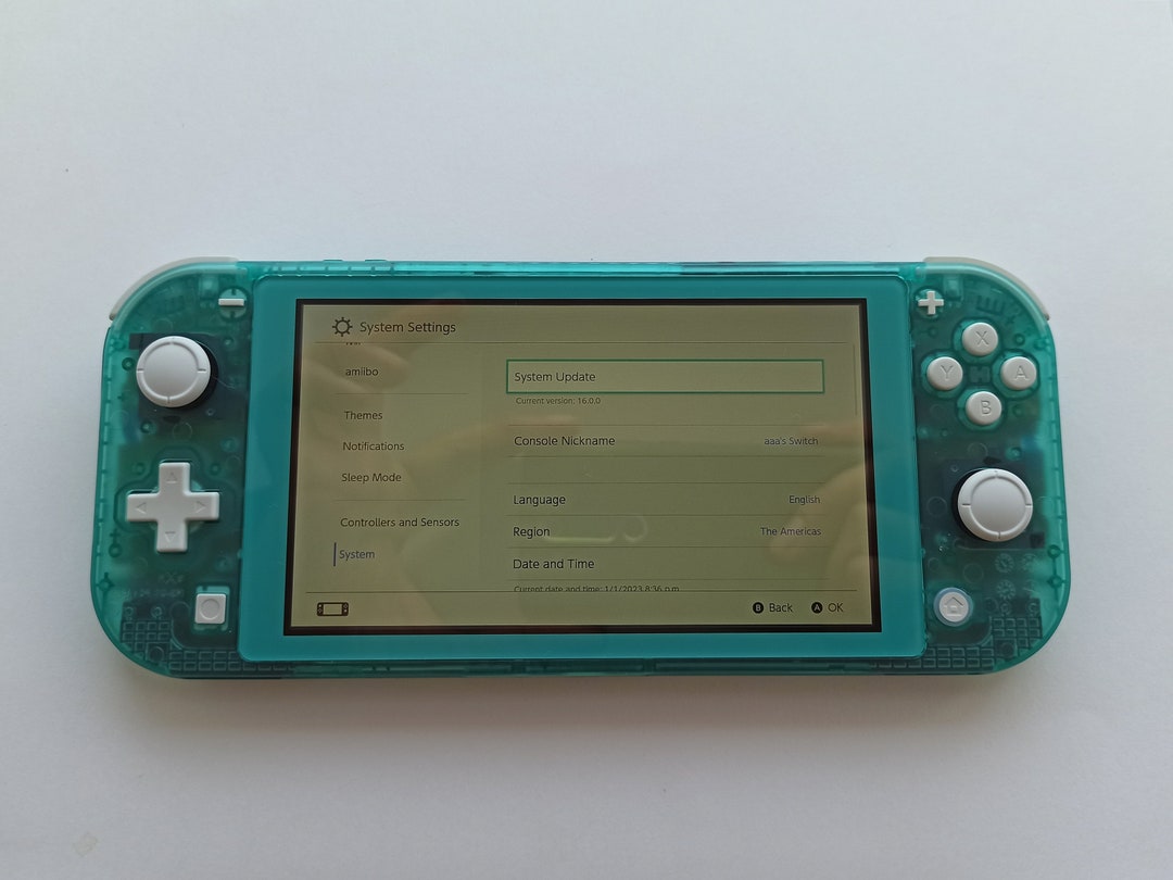 カスタムクリアティールグリーンNintendo Switch Liteコンソール
