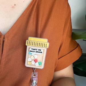 Medicine container badge reel / medicine badge/ humor/ funny shaker