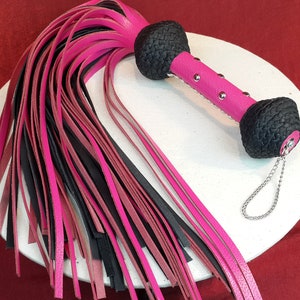 Heavy Leather Pink and Black Leather Flogger.