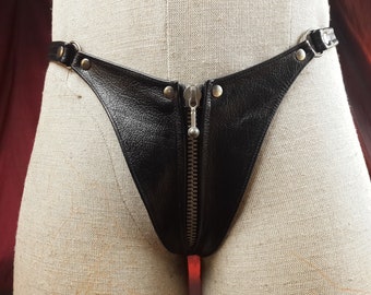 Female Leather G-String with front silver Zip detail and side adjustable buckles.