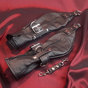 Hand restraint Mitten set with Black leather wrist belts.