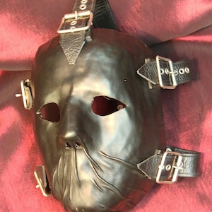 Closed Mouth Leather Face Mask with full head harness and belt and buckle detail.