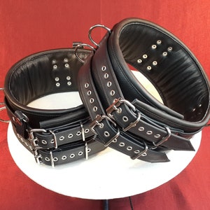 Luxury linned Super Heavy thigh cuffs with double belt and buckle detail.
