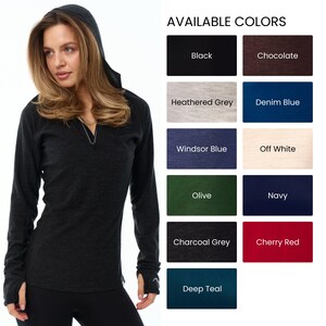 May include: A dark gray hooded long-sleeve shirt with a zipper at the neckline. The shirt has thumb holes and is shown with a variety of available colors, including black, chocolate, and denim blue. The text "AVAILABLE COLORS" is at the top.