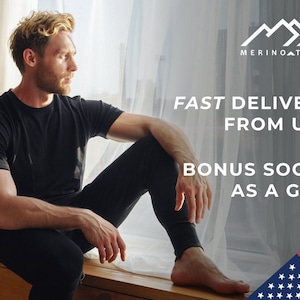 May include: A black short-sleeved t-shirt and matching black pants. The image includes the text MERINO TECH, FAST DELIVERY FROM USA, and BONUS SOCKS AS A GIFT, along with a mountain logo and a graphic of the American flag in the bottom corner.
