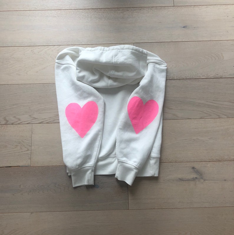 Women\u2019s hand painted pink heart hoodie size large.
