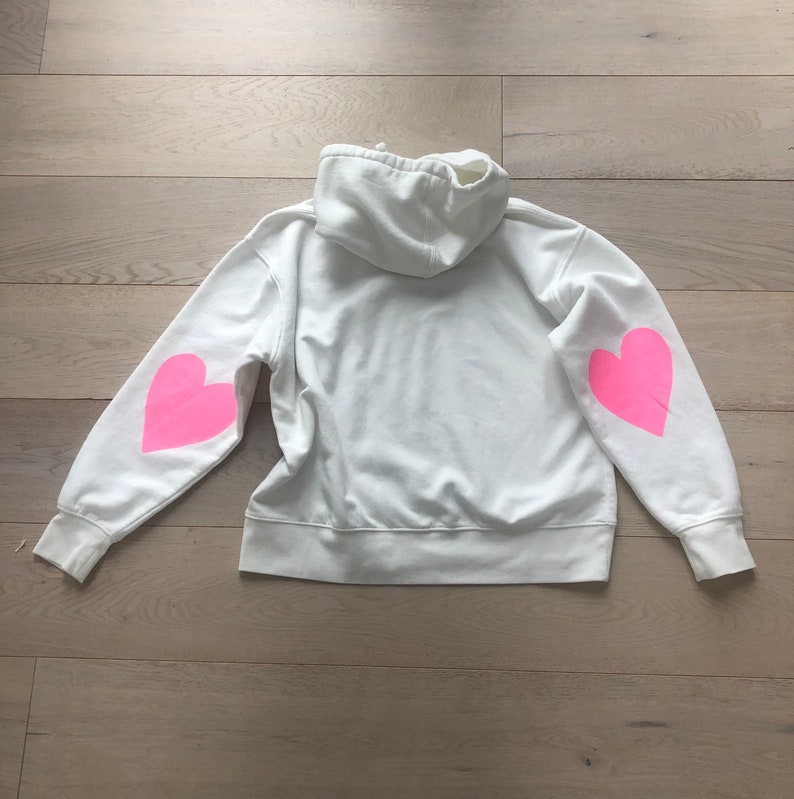 Women\u2019s hand painted pink heart hoodie size large.