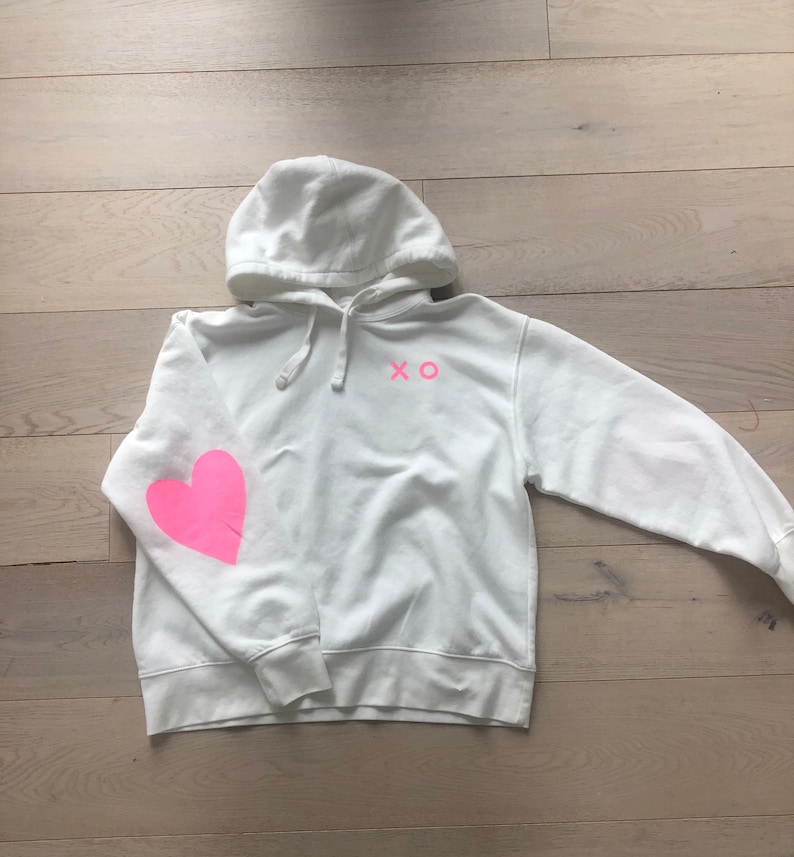 Women\u2019s hand painted pink heart hoodie size large.
