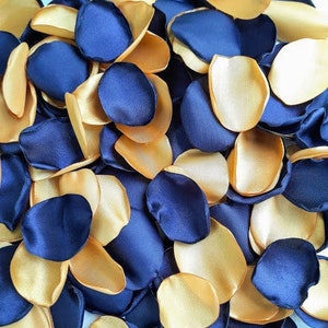 Royal blue and gold wedding decor Gold flower petals Royal blue flower