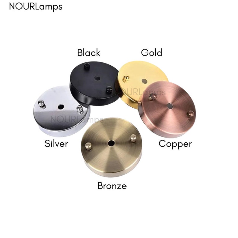 Puede incluir: Cinco cubiertas de dosel para luminarias de techo en diferentes acabados: negro, dorado, plateado, cobre y bronce.
