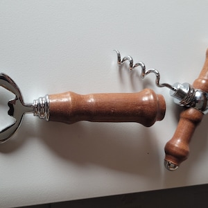 Bottle opener with corkscrew