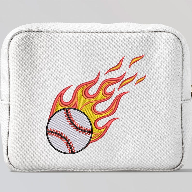 May include: A white cosmetic bag with an embroidered design of a baseball on fire. The baseball has red stitching, and the flames are yellow and red.