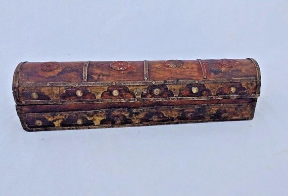 A centuries-old Persian Kalamdan tradition brought to your desk — hand-painted lacquerwork in a form most people have genuinely never encountered.