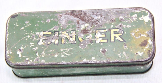 Collectible Vintage Singer Sewing Machine Tin Box with Accessories Unique German Craft Storage Ideal for Sewing Enthusiasts and Collectors