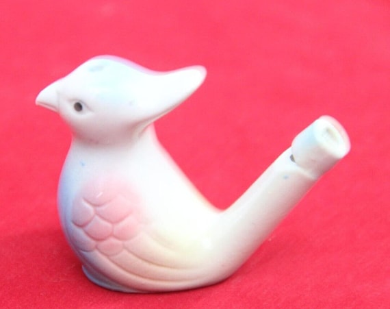 磁器製の鳥の形をした水笛：風変わりなセラミック製ホーム