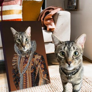 May include: A tabby cat dressed in a brown and gold patterned robe with a pearl necklace and a white lace collar. The cat is looking directly at the camera. The background is a brown canvas.