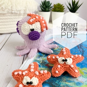 May include: Crochet pattern PDF for a purple octopus with white and pink polka dots and two orange starfish with white and pink polka dots. The octopus has big white eyes with black pupils and a purple nose. The starfish have white eyes with black pupils.