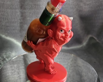 Support pour sauce piquante Devilish Devilish avec sauce piquante gratuite