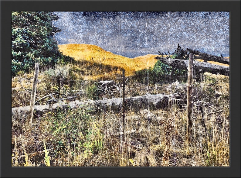 Worn Fence Under Dark Skies Light on Background Mountain image 3