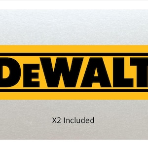 May include: A yellow rectangle with black text that reads "DEWALT" in all caps. The text is outlined in black and there are two black lines above and below the text. The text "X2 Included" is below the rectangle.