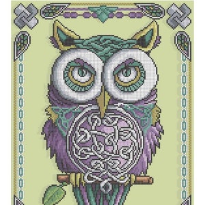 May include: A cross-stitch pattern featuring a stylized owl with purple and teal plumage, large white eyes, and a central chest area decorated with intricate white Celtic knotwork. The owl is perched on a branch against a light green background.